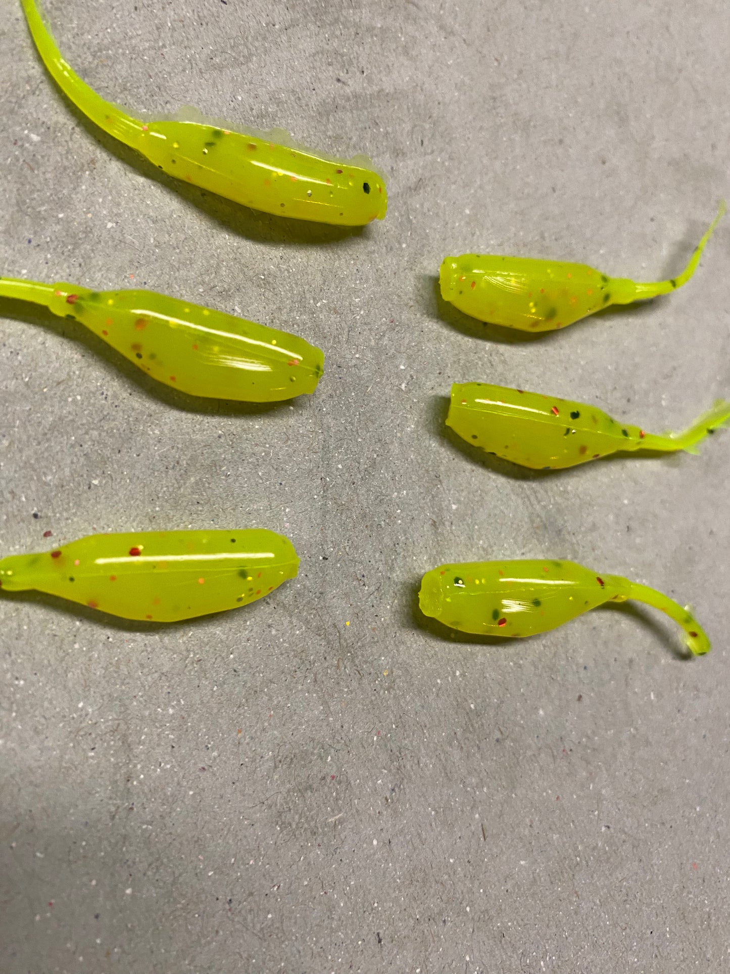 6 Crappie baits. Blue or Chartreuse