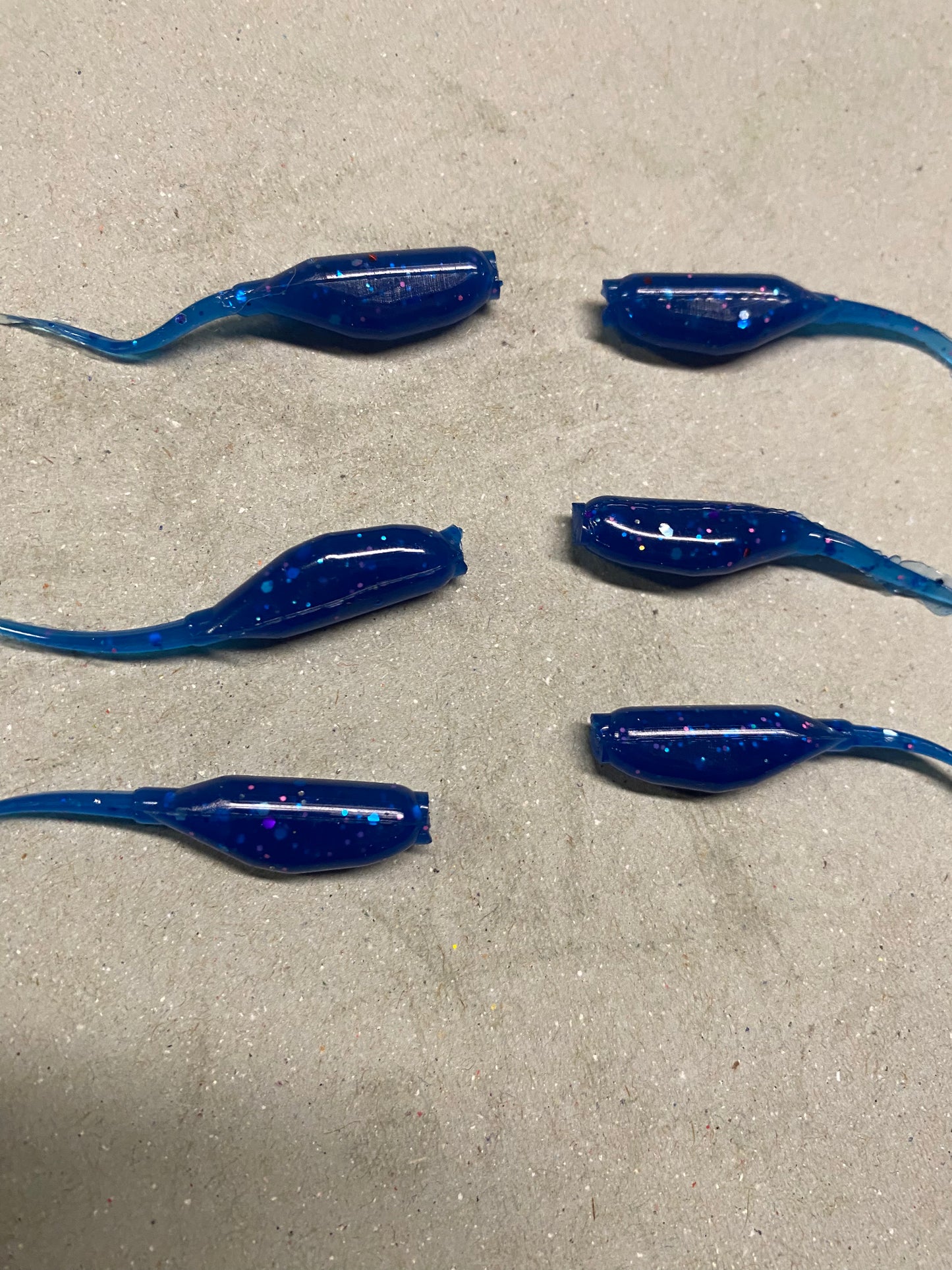 6 Crappie baits. Blue or Chartreuse