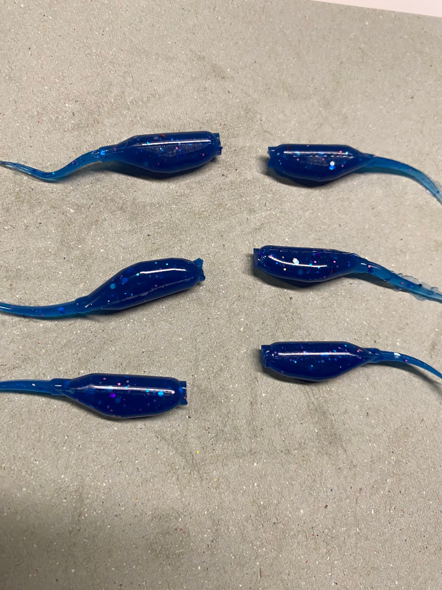 6 Crappie baits. Blue or Chartreuse